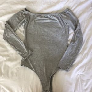 Pretty little thing off the shoulder body suit